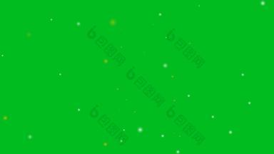 模糊银黄金雪飞行褪了色的摘要运动闪闪发光的粒子绿色屏幕背景